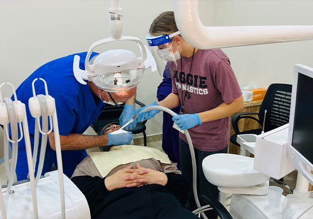 Angled shot of dental patient being treated