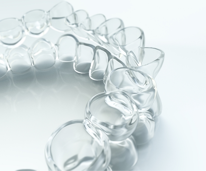 Two ClearCorrect aligners on a counter